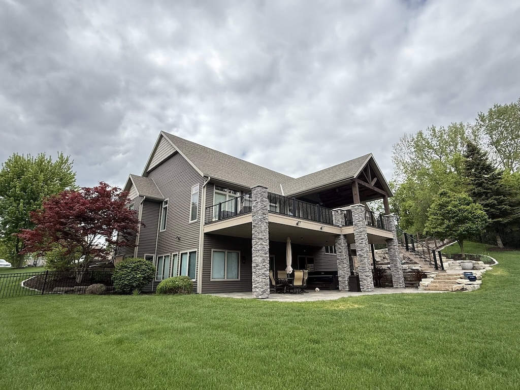Landscaped backyard and lawn project by Stern Lawn & Landscaping LLC in the Wausau area